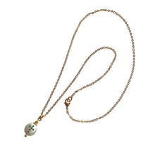Load image into Gallery viewer, Natural, high quality Freshwater Coin Pearl pendant in Cream White color is inlaid with Bohemian Crystals in Emerald color, suspended from 24K Gold plated sparkly link chain, measuring 18" long | Manukyan Design Studio