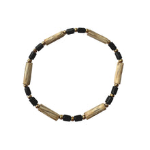 Load image into Gallery viewer, Urban Boho - Willow Stretch Bracelet is designed with tubular beads of different natural Woods in Ivory and Black, accented with 24K Gold plated beads | Manukyan Design Studio
