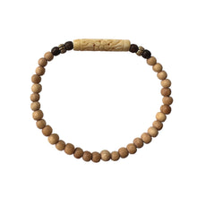 Load image into Gallery viewer, Urban Boho - Ivory Stretch Bracelet is designed with elongated tubular bead hand carved out of natural Bone and finished with natural and Brown Wood and 24K Gold plated beads | Manukyan Design Studio
