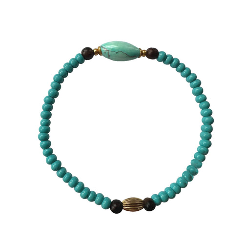 Urban Boho - Stretch Bracelet Is designed with Blue Howlite and natural Turquoise, accented with Brown Wood and 24K Gold plated beads | Manukyan Design Studio