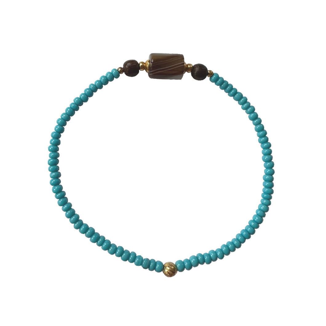 Urban Boho - Bernardette Stretch Bracelet is designed with natural Sardonyx, glass beads in Turquoise color, accented with Brown Wood and 24K Gold plated beads | Manukyan Design Studio