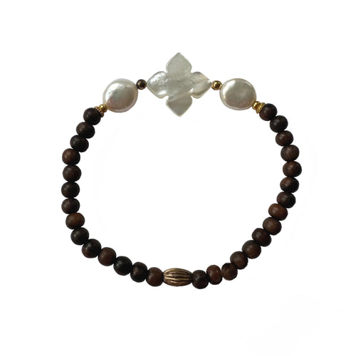 Urban Boho - Dora Stretch Bracelet is designed with quatrefoil shape Mother of Pearl, Freshwater Coin Pearl, natural Brown beads, and accented with 24K Gold plated beads | Manukyan Design Studio