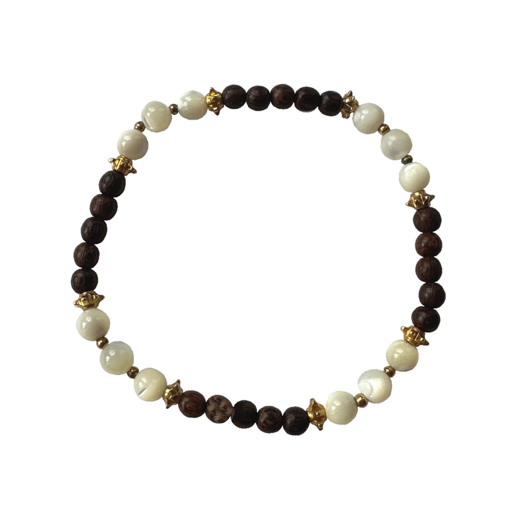 Urban Boho - Shellby Stretch Bracelet is designed with Mother of Pearl and natural Brown Wood beads, accented with 24K Gold plated beads | Manukyan Design Studio