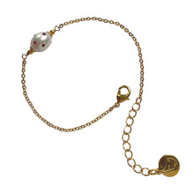 Load image into Gallery viewer, Natural, high quality Freshwater Pearl in Cream White color is inlaid with Bohemian Crystals in Fuchsia, finished with 24K Gold plated sparkly link chain. The bracelet measures 7&quot; long , plus additional 1.5&quot; adjustable chain to accommodate all sizes of wrists | Manukyan Design Studio
