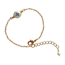 Load image into Gallery viewer, Natural, high quality Freshwater Pearl in Cream White color is inlaid with Bohemian Crystals in Sapphire, finished with 24K Gold plated corrugated link chain. The bracelet measures 6.5&quot; long , plus additional 1.5&quot; adjustable chain to accommodate all sizes of wrists | Manukyan Design Studio
