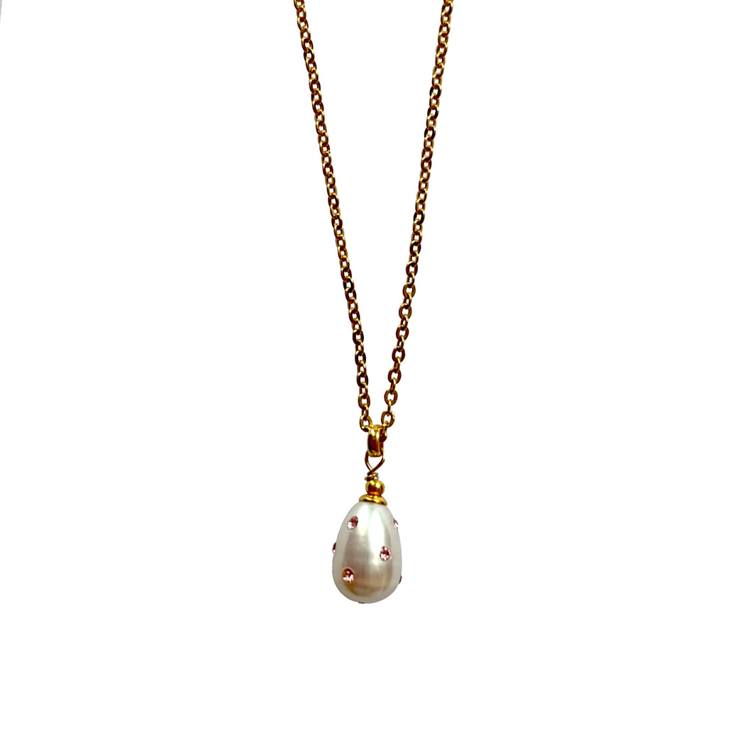 Natural, high quality Freshwater Pearl pendant in Cream White color is inlaid with Bohemian Crystals in Rose color, suspended from 24K Gold plated sparkly link chain, measuring 18