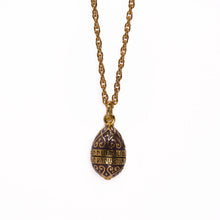 Load image into Gallery viewer, Imperial Treasures - Ressurection Egg Long Necklace  in Gold and Lilac Translucent Enamel.Engraved inscription reads &quot;Christ is risen from the dead, blesses is the resurrection of Christ&quot; in Armenian language. 
